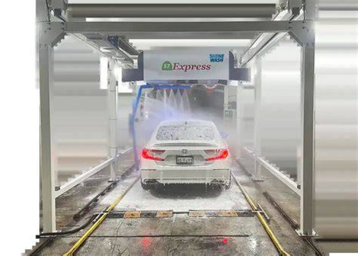 How much water is used in an automatic car wash per wash?